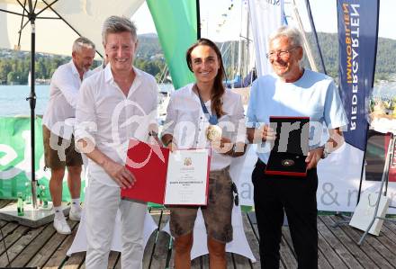 Segeln. Empfang Olympiasiegerin Lara Vadlau.  Arno Arthofer, Lara Vadlau, LH Peter Kaiser . Velden, am 15.8.2024.
Foto: Kuess
www.qspictures.net
---
pressefotos, pressefotografie, kuess, qs, qspictures, sport, bild, bilder, bilddatenbank