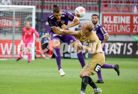 Fussball Bundesliga. SK Austria Klagenfurt gegen SK Puntigamer Sturm Graz. Niklas Szerencsi,  (Klagenfurt),  Mika Biereth (Graz).  Klagenfurt, am 17.8.2024.
Foto: Kuess
www.qspictures.net
---
pressefotos, pressefotografie, kuess, qs, qspictures, sport, bild, bilder, bilddatenbank