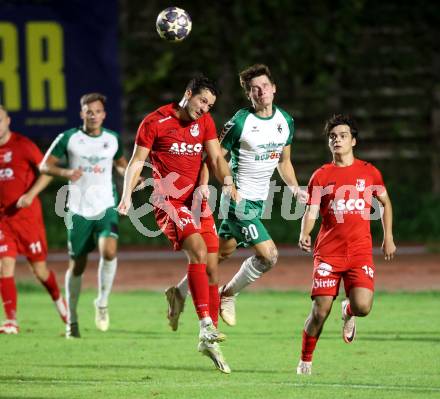 Fussball Kaerntner Liga. Voelkermarkt gegen ATSV Wolfsberg. Raphael Lukas Kulterer (Voelkermarkt),   Bastian Rupp (Wolfsberg). Voelkermarkt, am 30.8.2024.
Foto: Kuess
www.qspictures.net
---
pressefotos, pressefotografie, kuess, qs, qspictures, sport, bild, bilder, bilddatenbank