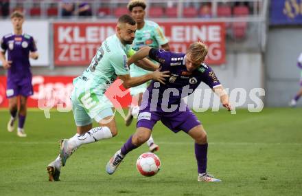 Fussball Bundesliga.  SK Austria Klagenfurt gegen TSV Egger Glas Hartberg . Jonas Kuehn,  (Klagenfurt), Juergen Heil   (Hartberg). Klagenfurt, am 21.9.2024.
Foto: Kuess
www.qspictures.net
---
pressefotos, pressefotografie, kuess, qs, qspictures, sport, bild, bilder, bilddatenbank