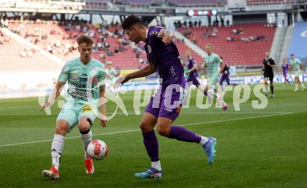 Fussball Bundesliga.  SK Austria Klagenfurt gegen TSV Egger Glas Hartberg . David Toshevski,   (Klagenfurt),  Fabian Wilfinger (Hartberg). Klagenfurt, am 21.9.2024.
Foto: Kuess
www.qspictures.net
---
pressefotos, pressefotografie, kuess, qs, qspictures, sport, bild, bilder, bilddatenbank