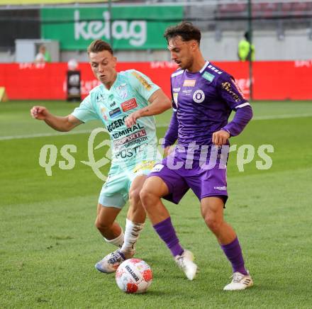 Fussball Bundesliga.  SK Austria Klagenfurt gegen TSV Egger Glas Hartberg .  Simon Straudi,  (Klagenfurt),  Manuel Pfeifer (Hartberg). Klagenfurt, am 21.9.2024.
Foto: Kuess
www.qspictures.net
---
pressefotos, pressefotografie, kuess, qs, qspictures, sport, bild, bilder, bilddatenbank