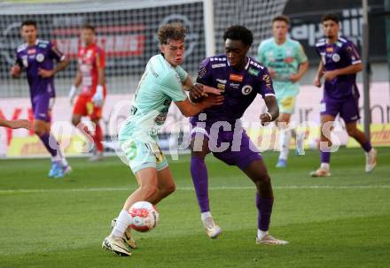 Fussball Bundesliga.  SK Austria Klagenfurt gegen TSV Egger Glas Hartberg . Dikeni-Rafid Salifou,   (Klagenfurt),  Maximilian Fillafer (Hartberg). Klagenfurt, am 21.9.2024.
Foto: Kuess
www.qspictures.net
---
pressefotos, pressefotografie, kuess, qs, qspictures, sport, bild, bilder, bilddatenbank