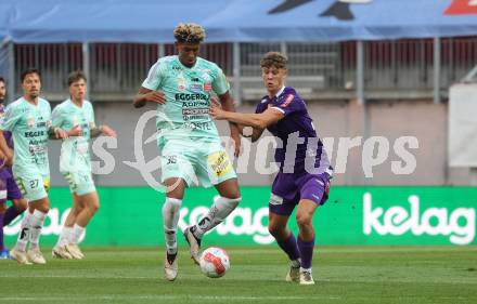 Fussball Bundesliga.  SK Austria Klagenfurt gegen TSV Egger Glas Hartberg .  Jannik Robatsch,  (Klagenfurt),  Justin Omoregie (Hartberg). Klagenfurt, am 21.9.2024.
Foto: Kuess
www.qspictures.net
---
pressefotos, pressefotografie, kuess, qs, qspictures, sport, bild, bilder, bilddatenbank