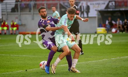 Fussball Bundesliga.  SK Austria Klagenfurt gegen TSV Egger Glas Hartberg .  Kosmas Gkezos,  (Klagenfurt),   Maximilian Fillafer (Hartberg). Klagenfurt, am 21.9.2024.
Foto: Kuess
www.qspictures.net
---
pressefotos, pressefotografie, kuess, qs, qspictures, sport, bild, bilder, bilddatenbank