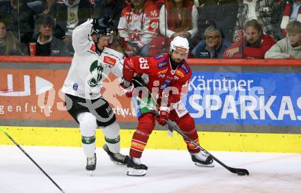 EBEL. Eishockey Bundesliga. KAC gegen Olimpija Ljubljana.  Raphael Herburger,   (KAC), Maris Bicevskis  (Ljubljana). Klagenfurt, 22.9.2024. 
Foto: Kuess
www.qspictures.net
---
pressefotos, pressefotografie, kuess, qs, qspictures, sport, bild, bilder, bilddatenbank