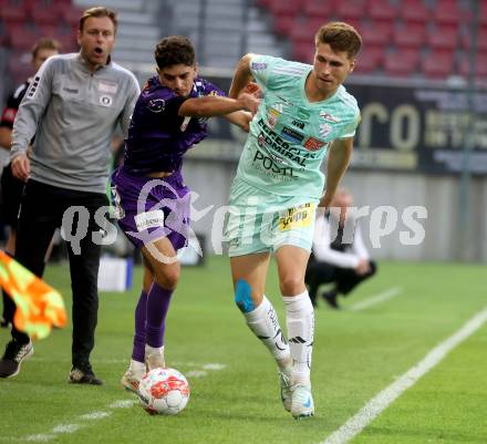 Fussball Bundesliga.  SK Austria Klagenfurt gegen TSV Egger Glas Hartberg .  Ben Bobzien,  (Klagenfurt),  Marco Phillip Hoffmann (Hartberg). Klagenfurt, am 21.9.2024.
Foto: Kuess
www.qspictures.net
---
pressefotos, pressefotografie, kuess, qs, qspictures, sport, bild, bilder, bilddatenbank