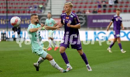 Fussball Bundesliga.  SK Austria Klagenfurt gegen TSV Egger Glas Hartberg . Jonas Kuehn,   (Klagenfurt),   Juergen Heil (Hartberg). Klagenfurt, am 21.9.2024.
Foto: Kuess
www.qspictures.net
---
pressefotos, pressefotografie, kuess, qs, qspictures, sport, bild, bilder, bilddatenbank