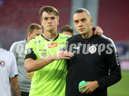 Fussball Bundesliga.  SK Austria Klagenfurt gegen TSV Egger Glas Hartberg .  Simon Spari, Niklas Szerencsi (Klagenfurt). Klagenfurt, am 21.9.2024.
Foto: Kuess
www.qspictures.net
---
pressefotos, pressefotografie, kuess, qs, qspictures, sport, bild, bilder, bilddatenbank