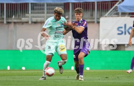 Fussball Bundesliga.  SK Austria Klagenfurt gegen TSV Egger Glas Hartberg . Jannik Robatsch,  (Klagenfurt),   Justin Omoregie  (Hartberg). Klagenfurt, am 21.9.2024.
Foto: Kuess
www.qspictures.net
---
pressefotos, pressefotografie, kuess, qs, qspictures, sport, bild, bilder, bilddatenbank