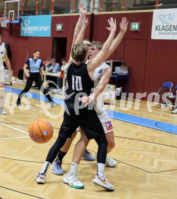 Basketball 2. Liga 2024/2025. Grunddurchgang 1. Runde. Woerthersee Piraten gegen Dornbirn Lions. Emilio Rozmann (Piraten), Davids Grinbergs  (Dornbirn). Klagenfurt, am 28.9.2024.
Foto: Kuess


---
pressefotos, pressefotografie, kuess, qs, qspictures, sport, bild, bilder, bilddatenbank