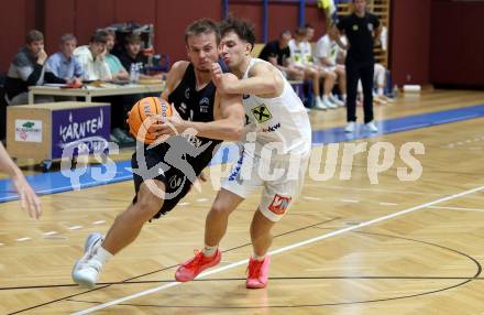 Basketball 2. Liga 2024/2025. Grunddurchgang 1. Runde. Woerthersee Piraten gegen Dornbirn Lions. Elvis Keric (Piraten),  Pauls Miglinieks  (Dornbirn). Klagenfurt, am 28.9.2024.
Foto: Kuess


---
pressefotos, pressefotografie, kuess, qs, qspictures, sport, bild, bilder, bilddatenbank