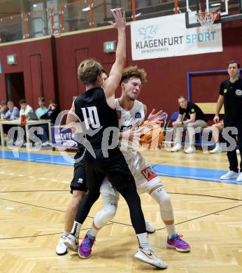 Basketball 2. Liga 2024/2025. Grunddurchgang 1. Runde. Woerthersee Piraten gegen Dornbirn Lions. Emilio Rozmann (Piraten),  Berk Mehmed (Dornbirn). Klagenfurt, am 28.9.2024.
Foto: Kuess


---
pressefotos, pressefotografie, kuess, qs, qspictures, sport, bild, bilder, bilddatenbank