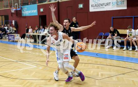 Basketball 2. Liga 2024/2025. Grunddurchgang 1. Runde. Woerthersee Piraten gegen Dornbirn Lions. Jan-Arne Apschner (Piraten),  Berk Mehmed (Dornbirn). Klagenfurt, am 28.9.2024.
Foto: Kuess


---
pressefotos, pressefotografie, kuess, qs, qspictures, sport, bild, bilder, bilddatenbank