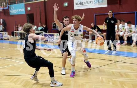 Basketball 2. Liga 2024/2025. Grunddurchgang 1. Runde. Woerthersee Piraten gegen Dornbirn Lions. Jan-Arne Apschner (Piraten),  Berk Mehmed (Dornbirn). Klagenfurt, am 28.9.2024.
Foto: Kuess


---
pressefotos, pressefotografie, kuess, qs, qspictures, sport, bild, bilder, bilddatenbank