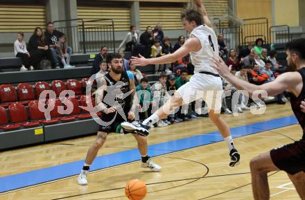 Basketball 2. Liga 2024/2025. Grunddurchgang 2. Runde. KOS Celovec gegen Mistelbach Mustangs.  Samuel Seher (KOS),  Zdenek Nehyba (Mistelbach Mustangs). Klagenfurt, am 5.10.2024.
Foto: Kuess


---
pressefotos, pressefotografie, kuess, qs, qspictures, sport, bild, bilder, bilddatenbank