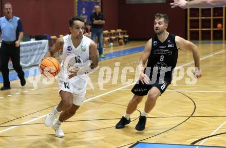 Basketball 2. Liga 2024/2025. Grunddurchgang 2. Runde. KOS Celovec gegen Mistelbach Mustangs.  Mauro Gerszke (KOS), Jan Kozina   (Mistelbach Mustangs). Klagenfurt, am 5.10.2024.
Foto: Kuess


---
pressefotos, pressefotografie, kuess, qs, qspictures, sport, bild, bilder, bilddatenbank