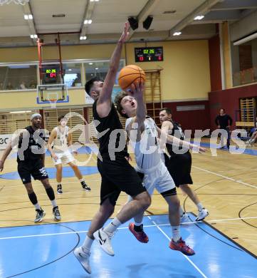 Basketball 2. Bundesliga 2024/25. Grunddurchgang 3. Runde.. Woerthersee Piraten gegen  Raiders Tirol. Marin Sliskovic (Piraten), Tim-Joel Deschner (Tirol).  Klagenfurt, am 12.10.2024.
Foto: Kuess
---
pressefotos, pressefotografie, kuess, qs, qspictures, sport, bild, bilder, bilddatenbank