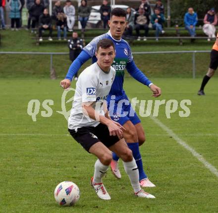 Fussball KÃ¤rntner Liga. Bleiburg gegen Dellach/Gail.  Aljaz Storman (Bleiburg),  Saso Kovacevic (Dellach).  Bleiburg, am 19.10.2024.
Foto: Kuess
---
pressefotos, pressefotografie, kuess, qs, qspictures, sport, bild, bilder, bilddatenbank