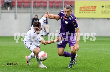 Fussball Bundesliga.  SK Austria Klagenfurt gegen Austria Wien .  Niklas Szerencsi,  (Klagenfurt),  Nik Prelec (Wien). Klagenfurt, am 20.10.2024.
Foto: Kuess
www.qspictures.net
---
pressefotos, pressefotografie, kuess, qs, qspictures, sport, bild, bilder, bilddatenbank