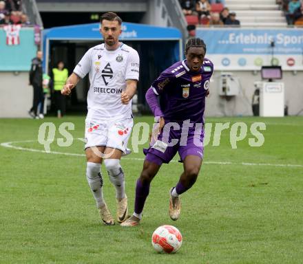 Fussball Bundesliga.  SK Austria Klagenfurt gegen Austria Wien . Dikeni-Rafid Salifou,   (Klagenfurt), Marvin Potzmann  (Wien). Klagenfurt, am 20.10.2024.
Foto: Kuess
www.qspictures.net
---
pressefotos, pressefotografie, kuess, qs, qspictures, sport, bild, bilder, bilddatenbank