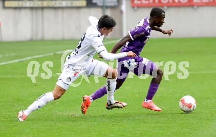 Fussball Bundesliga.  SK Austria Klagenfurt gegen Austria Wien .  Solomon Bonnah,  (Klagenfurt), Matteo Perez Vinloef  (Wien). Klagenfurt, am 20.10.2024.
Foto: Kuess
www.qspictures.net
---
pressefotos, pressefotografie, kuess, qs, qspictures, sport, bild, bilder, bilddatenbank