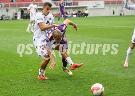 Fussball Bundesliga.  SK Austria Klagenfurt gegen Austria Wien .  Jannik Robatsch,  (Klagenfurt), Manfred Fischer  (Wien). Klagenfurt, am 20.10.2024.
Foto: Kuess
www.qspictures.net
---
pressefotos, pressefotografie, kuess, qs, qspictures, sport, bild, bilder, bilddatenbank