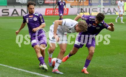 Fussball Bundesliga.  SK Austria Klagenfurt gegen Austria Wien .  Simon Straudi, Ben Bobzien, (Klagenfurt),  Philipp Maybach (Wien). Klagenfurt, am 20.10.2024.
Foto: Kuess
www.qspictures.net
---
pressefotos, pressefotografie, kuess, qs, qspictures, sport, bild, bilder, bilddatenbank