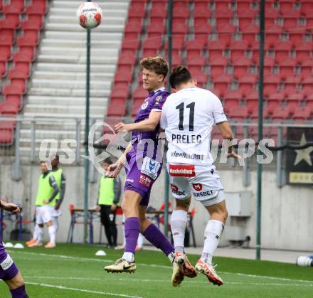 Fussball Bundesliga.  SK Austria Klagenfurt gegen Austria Wien .  Jannik Robatsch,  (Klagenfurt), Nik Prelec  (Wien). Klagenfurt, am 20.10.2024.
Foto: Kuess
www.qspictures.net
---
pressefotos, pressefotografie, kuess, qs, qspictures, sport, bild, bilder, bilddatenbank