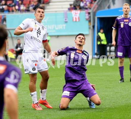 Fussball Bundesliga.  SK Austria Klagenfurt gegen Austria Wien . David Toshevski,  (Klagenfurt),  Manfred Fischer  (Wien). Klagenfurt, am 20.10.2024.
Foto: Kuess
www.qspictures.net
---
pressefotos, pressefotografie, kuess, qs, qspictures, sport, bild, bilder, bilddatenbank