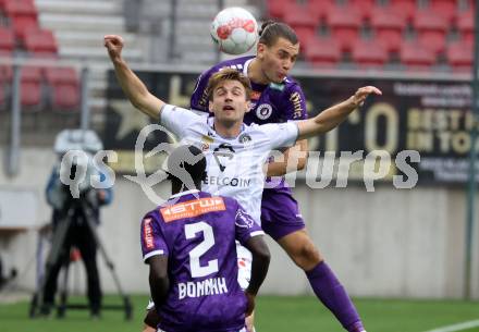 Fussball Bundesliga.  SK Austria Klagenfurt gegen Austria Wien . Niklas Szerencsi,   (Klagenfurt), Marko Raguz  (Wien). Klagenfurt, am 20.10.2024.
Foto: Kuess
www.qspictures.net
---
pressefotos, pressefotografie, kuess, qs, qspictures, sport, bild, bilder, bilddatenbank