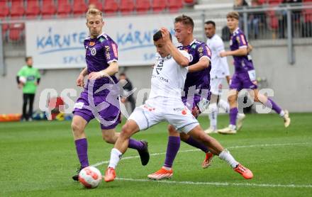 Fussball Bundesliga.  SK Austria Klagenfurt gegen Austria Wien . Tobias Koch, Christopher Cvetko,  (Klagenfurt),  Manfred Fischer  (Wien). Klagenfurt, am 20.10.2024.
Foto: Kuess
www.qspictures.net
---
pressefotos, pressefotografie, kuess, qs, qspictures, sport, bild, bilder, bilddatenbank