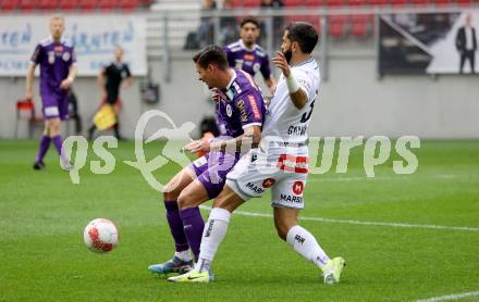 Fussball Bundesliga.  SK Austria Klagenfurt gegen Austria Wien .  David Toshevski, (Klagenfurt),  Lucas Galvao Da Costa Souza (Wien). Klagenfurt, am 20.10.2024.
Foto: Kuess
www.qspictures.net
---
pressefotos, pressefotografie, kuess, qs, qspictures, sport, bild, bilder, bilddatenbank