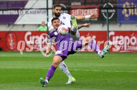 Fussball Bundesliga.  SK Austria Klagenfurt gegen Austria Wien .  David Toshevski, (Klagenfurt), Lucas Galvao Da Costa Souza  (Wien). Klagenfurt, am 20.10.2024.
Foto: Kuess
www.qspictures.net
---
pressefotos, pressefotografie, kuess, qs, qspictures, sport, bild, bilder, bilddatenbank