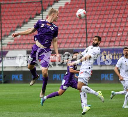 Fussball Bundesliga.  SK Austria Klagenfurt gegen Austria Wien .  Nicolas Binder, (Klagenfurt),  Lucas Galvao Da Costa Souza (Wien). Klagenfurt, am 20.10.2024.
Foto: Kuess
www.qspictures.net
---
pressefotos, pressefotografie, kuess, qs, qspictures, sport, bild, bilder, bilddatenbank