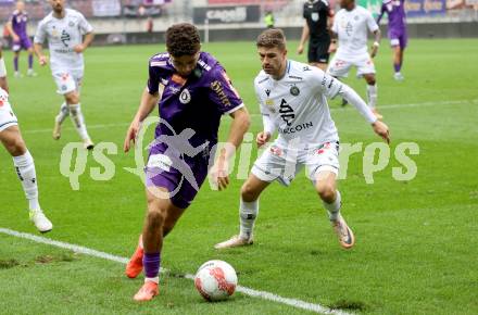 Fussball Bundesliga.  SK Austria Klagenfurt gegen Austria Wien .  Ben Bobzien, (Klagenfurt),  Andreas Gruber  (Wien). Klagenfurt, am 20.10.2024.
Foto: Kuess
www.qspictures.net
---
pressefotos, pressefotografie, kuess, qs, qspictures, sport, bild, bilder, bilddatenbank