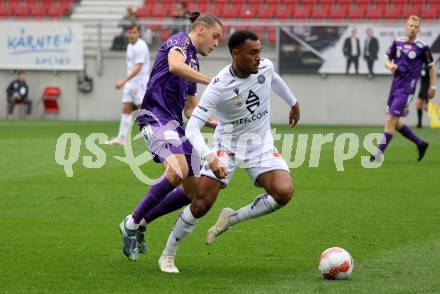 Fussball Bundesliga.  SK Austria Klagenfurt gegen Austria Wien .  Niklas Szerencsi,  (Klagenfurt),  Maurice Maximilian Malone (Wien). Klagenfurt, am 20.10.2024.
Foto: Kuess
www.qspictures.net
---
pressefotos, pressefotografie, kuess, qs, qspictures, sport, bild, bilder, bilddatenbank