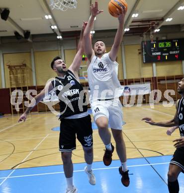 Basketball 2. Liga 2024/2025. Grunddurchgang 9. Runde. KOS Celovec gegen Woerthersee Piraten.  Veljko Dena (KOS),  Marin Sliskovic (Woerthersee Piraten). Klagenfurt, am 22.11.2024.
Foto: Kuess


---
pressefotos, pressefotografie, kuess, qs, qspictures, sport, bild, bilder, bilddatenbank