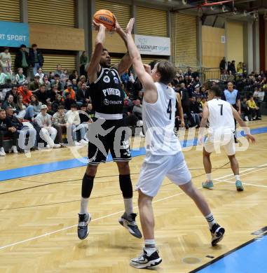 Basketball 2. Liga 2024/2025. Grunddurchgang 9. Runde. KOS Celovec gegen Woerthersee Piraten.   Samuel Seher  (KOS),  Shawn L. Ray  (Woerthersee Piraten). Klagenfurt, am 22.11.2024.
Foto: Kuess


---
pressefotos, pressefotografie, kuess, qs, qspictures, sport, bild, bilder, bilddatenbank