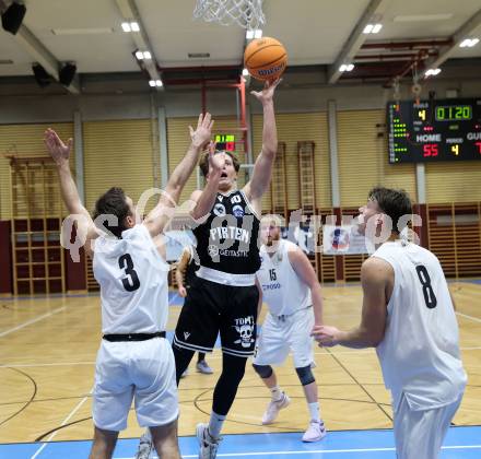 Basketball 2. Liga 2024/2025. Grunddurchgang 9. Runde. KOS Celovec gegen Woerthersee Piraten. Niklas Michel  (KOS),  Emilio Rozmann (Woerthersee Piraten). Klagenfurt, am 22.11.2024.
Foto: Kuess


---
pressefotos, pressefotografie, kuess, qs, qspictures, sport, bild, bilder, bilddatenbank