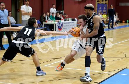 Basketball 2. Liga 2024/2025. Grunddurchgang 9. Runde. KOS Celovec gegen Woerthersee Piraten.  Niklas Michel (KOS), Shawn L. Ray   (Woerthersee Piraten). Klagenfurt, am 22.11.2024.
Foto: Kuess


---
pressefotos, pressefotografie, kuess, qs, qspictures, sport, bild, bilder, bilddatenbank