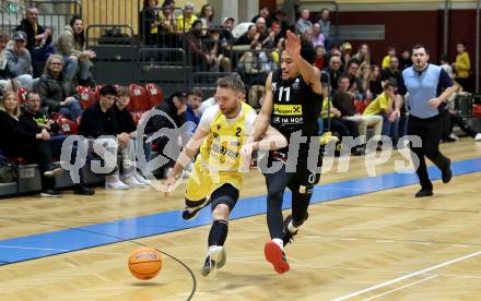 Basketball 2. Liga 2024/2025. Grunddurchgang 10. Runde.  Woerthersee Piraten gegen Mattersburg Rocks.  Tim Huber  (Woerthersee Piraten),  Yann Grandperret  (Mattersburg). Klagenfurt, am 30.11.2024.
Foto: Kuess


---
pressefotos, pressefotografie, kuess, qs, qspictures, sport, bild, bilder, bilddatenbank