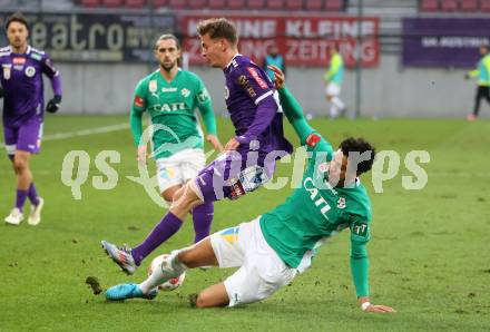 Fussball Bundesliga.  Austria Klagenfurt gegen WSG Tirol.  Laurenz Dehl,  (Austria Klagenfurt),  Jonas Benjamin Chimezie David (WSG Tirol). Klagenfurt, am 1.12.2024.
Foto: Kuess
www.qspictures.net
---
pressefotos, pressefotografie, kuess, qs, qspictures, sport, bild, bilder, bilddatenbank