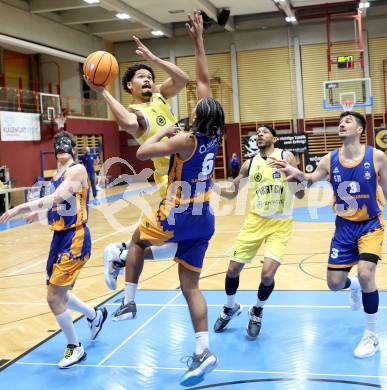 Basketball 2. Liga 2024/2025. Grunddurchgang 11. Runde.  Woerthersee Piraten gegen BBU Salzburg.   Marcus Holyfield	 (Woerthersee Piraten),  Samuel Gatterbauer  (Salzburg). Klagenfurt, am 7.12.2024.
Foto: Kuess


---
pressefotos, pressefotografie, kuess, qs, qspictures, sport, bild, bilder, bilddatenbank