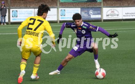 Fussball Bundesliga. Testspiel. SK Austria Klagenfurt gegen Lafnitz. Ben Bobzien (Austria Klagenfurt), Denis Dizdarevic (Lafnitz). Klagenfurt, am 31,1.2025.
Foto: Kuess
---
pressefotos, pressefotografie, kuess, qs, qspictures, sport, bild, bilder, bilddatenbank