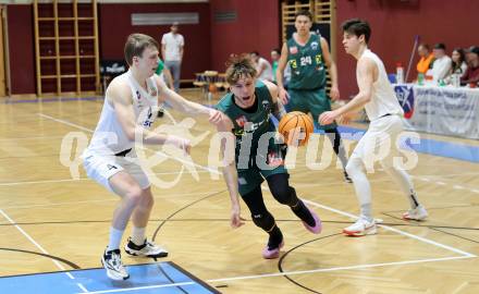 Basketball 2. Liga 2024/2025. Grunddurchgang 17. Runde.  KOS Celovec gegen Dornbirn Lions.   Samuel Seher (KOS Celovec),  Berk Mehmed  (Dornbirn Lions). Klagenfurt, am 1.2.2025.
Foto: Kuess


---
pressefotos, pressefotografie, kuess, qs, qspictures, sport, bild, bilder, bilddatenbank