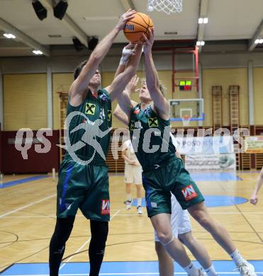 Basketball 2. Liga 2024/2025. Grunddurchgang 17. Runde.  KOS Celovec gegen Dornbirn Lions.   Eduard Nogues,  Davids Grinbergs (Dornbirn Lions). Klagenfurt, am 1.2.2025.
Foto: Kuess


---
pressefotos, pressefotografie, kuess, qs, qspictures, sport, bild, bilder, bilddatenbank