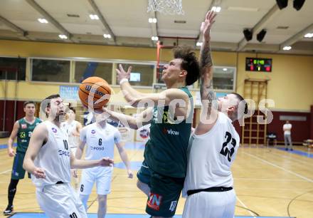 Basketball 2. Liga 2024/2025. Grunddurchgang 17. Runde.  KOS Celovec gegen Dornbirn Lions.   Nikolas Susa (KOS Celovec),   Mateja Djurasic (Dornbirn Lions). Klagenfurt, am 1.2.2025.
Foto: Kuess


---
pressefotos, pressefotografie, kuess, qs, qspictures, sport, bild, bilder, bilddatenbank