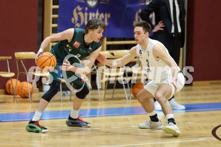 Basketball 2. Liga 2024/2025. Grunddurchgang 17. Runde.  KOS Celovec gegen Dornbirn Lions.   Niklas Michel (KOS Celovec),  Pauls Miglinieks  (Dornbirn Lions). Klagenfurt, am 1.2.2025.
Foto: Kuess


---
pressefotos, pressefotografie, kuess, qs, qspictures, sport, bild, bilder, bilddatenbank