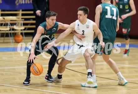 Basketball 2. Liga 2024/2025. Grunddurchgang 17. Runde.  KOS Celovec gegen Dornbirn Lions.   Niklas Michel (KOS Celovec),   Eduard Nogues (Dornbirn Lions). Klagenfurt, am 1.2.2025.
Foto: Kuess


---
pressefotos, pressefotografie, kuess, qs, qspictures, sport, bild, bilder, bilddatenbank